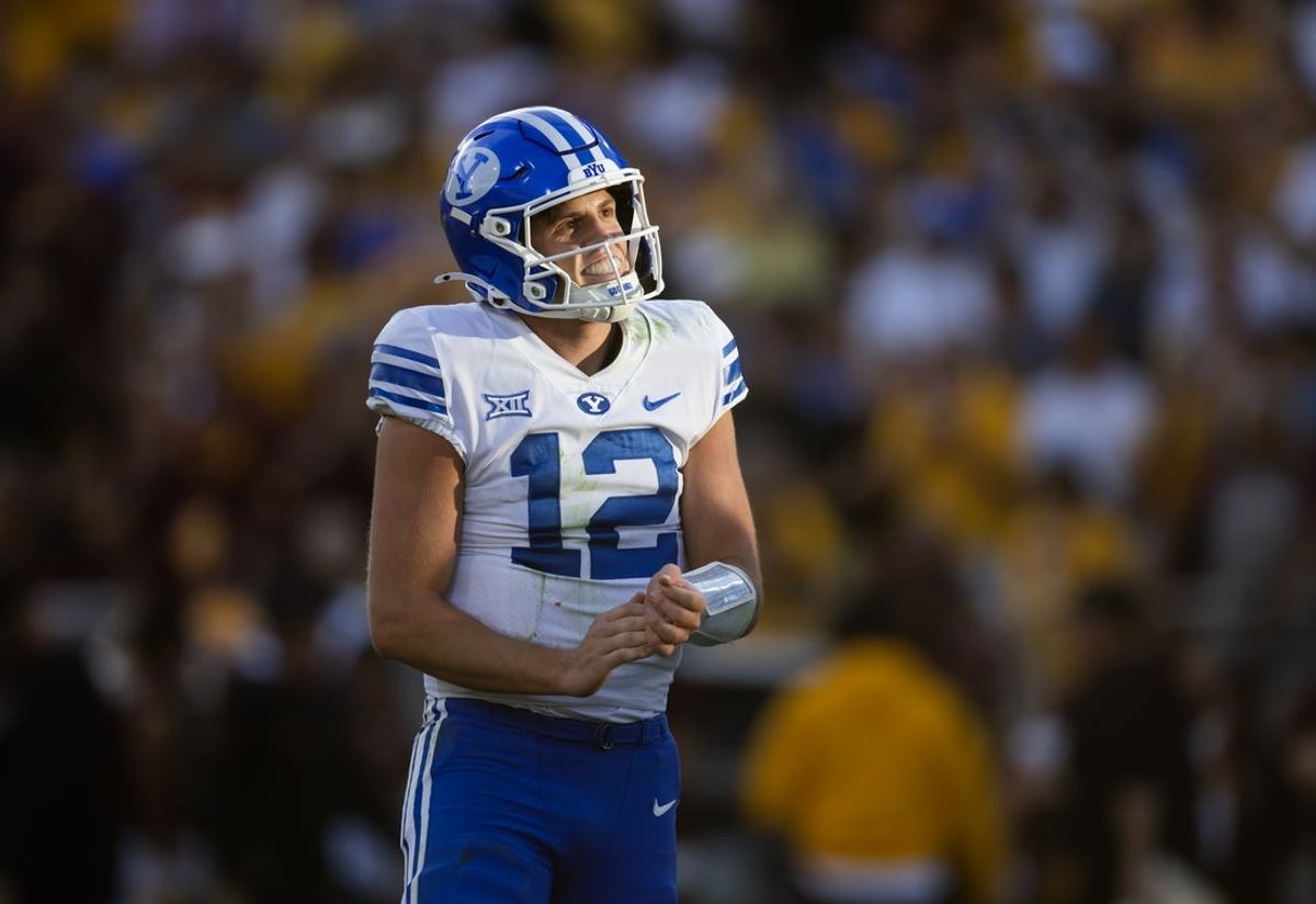 Nov 23, 2024; Tempe, Arizona, USA; Brigham Young Cougars quarterback Jake Retzlaff (12) against the Arizona State Sun Devils at Mountain America Stadium. Mandatory Credit: Mark J. Rebilas-Imagn Images