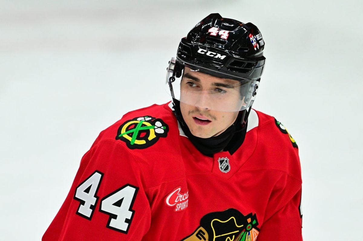 Nov 21, 2024; Chicago, Illinois, USA; Chicago Blackhawks defenseman Wyatt Kaiser (44) warms up against the Florida Panthers before the game at the United Center. Mandatory Credit: Daniel Bartel-Imagn Images