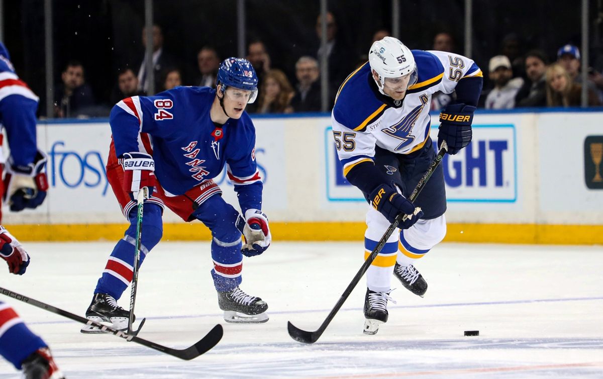Nov 25, 2024; New York, New York, USA; New York Rangers center Adam Edstrom (84) chases after St. Louis Blues defenseman Colton Parayko (55) and the puck during the first period at Madison Square Garden. Mandatory Credit: Danny Wild-Imagn Images