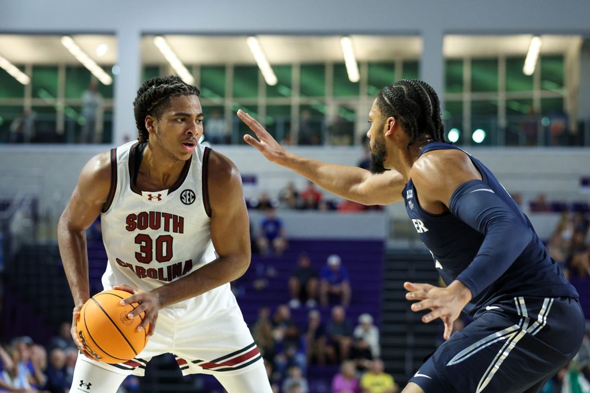 Nov 25, 2024; Fort Myers, Florida, USA; South Carolina Gamecocks forward Collin Murray-Boyles (30) is guarded by Xavier Musketeers forward Jerome Hunter (2) in the second half  at Suncoast Credit Union Arena. Mandatory Credit: Nathan Ray Seebeck-Imagn Images