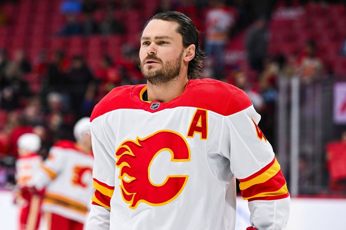 Nov 25, 2024; Ottawa, Ontario, CAN; Calgary Flames defenseman Rasmus Andersson (4) looks on during warm-up before the game against the Ottawa Senators at Canadian Tire Centre. Mandatory Credit: David Kirouac-Imagn Images