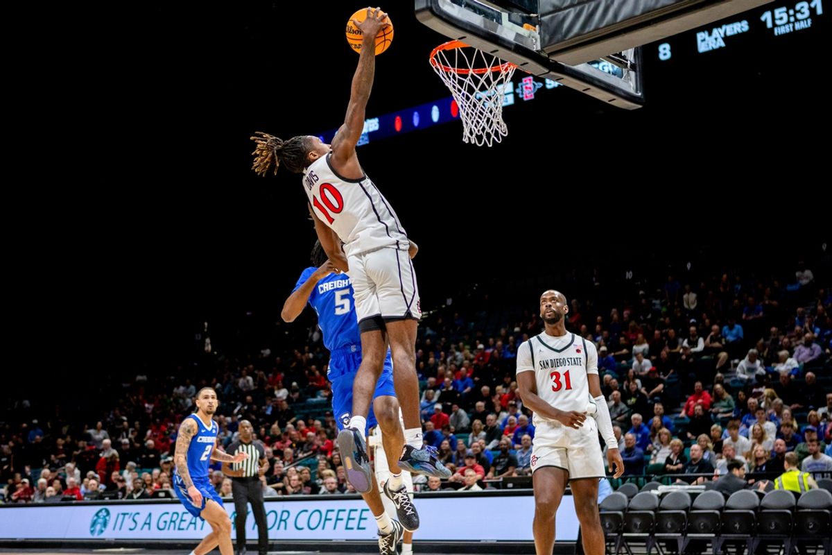 Nov 26, 2024; Las Vegas, Nevada, USA;  San Diego State Aztecs player BJ Davis (10) shoots against the Creighton Bluejays at MGM Grand Garden Arena. Mandatory Credit: Jeffrey (Tyge) O'Donnell-Imagn Images