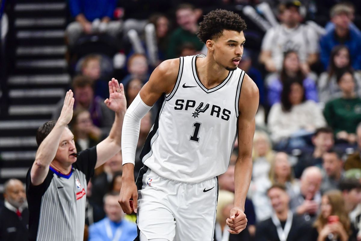 Nov 26, 2024; Salt Lake City, Utah, USA; San Antonio Spurs forward/center Victor Wembanyama (1) reacts after a three point shot call by referee Scott Twardoski (52) against the Utah Jazz during the first half at the Delta Center. Mandatory Credit: Christopher Creveling-Imagn Images