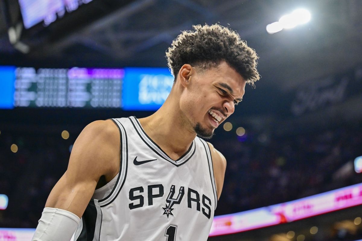 Nov 26, 2024; Salt Lake City, Utah, USA; San Antonio Spurs forward/center Victor Wembanyama (1) reacts after a collision with Utah Jazz forward/center Lauri Markkanen (not pictured) during the second half at Delta Center. Mandatory Credit: Christopher Creveling-Imagn Images