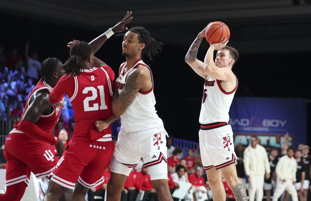 Louisville Cardinals guard Reyne Smith (6) shoots during the first half against the Indiana Hoosiers at the Atlantis Resort.  Mandatory Credit: Kevin Jairaj-Imagn Images