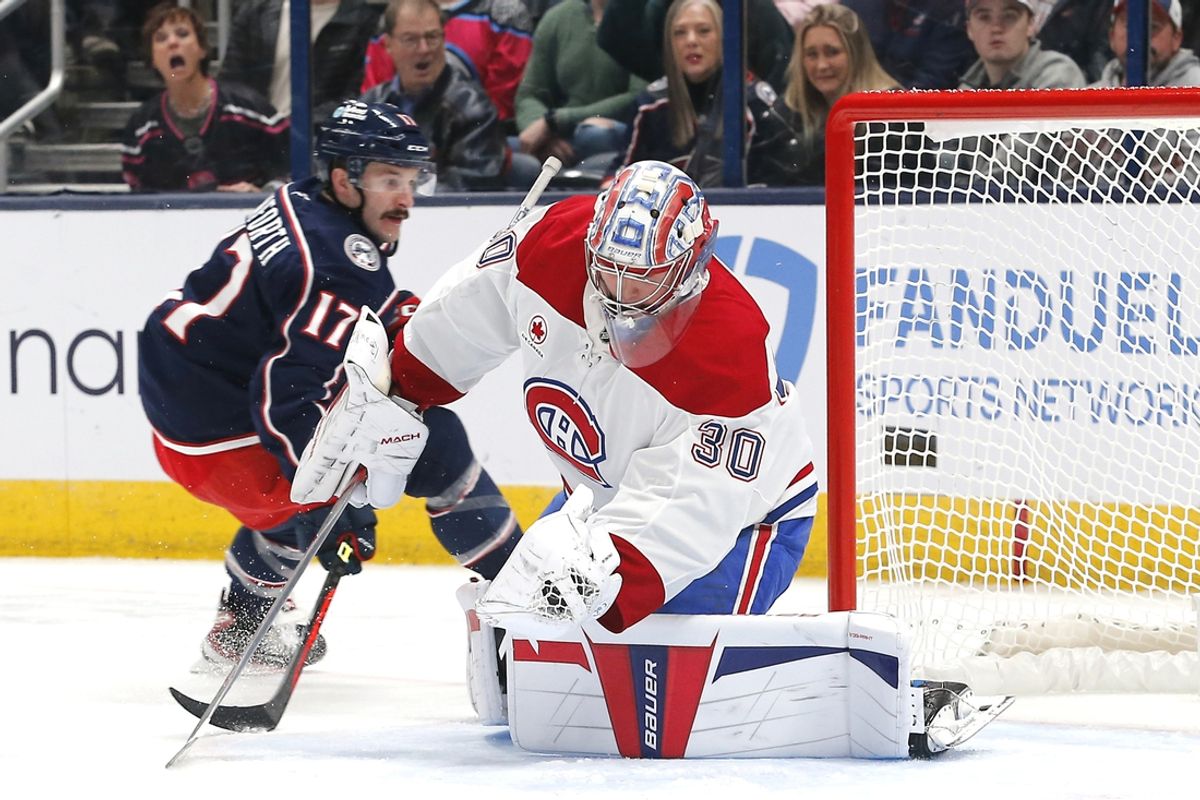 Nov 27, 2024; Columbus, Ohio, USA; Montreal Canadiens goalie Cayden Primeau (30) makes a glove save against the Columbus Blue Jackets during the first period at Nationwide Arena. Mandatory Credit: Russell LaBounty-Imagn Images