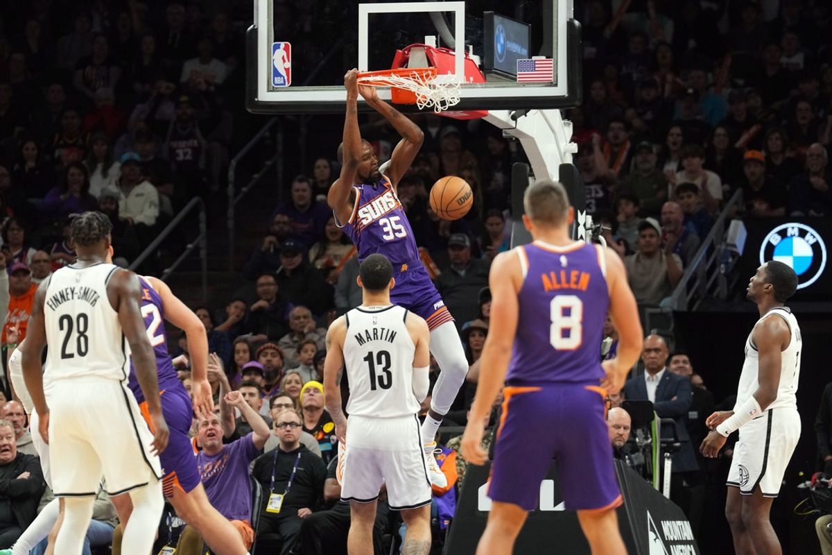 Nov 27, 2024; Phoenix, Arizona, USA; Phoenix Suns forward Kevin Durant (35) dunks against the Brooklyn Nets during the second half at Footprint Center. Mandatory Credit: Joe Camporeale-Imagn Images