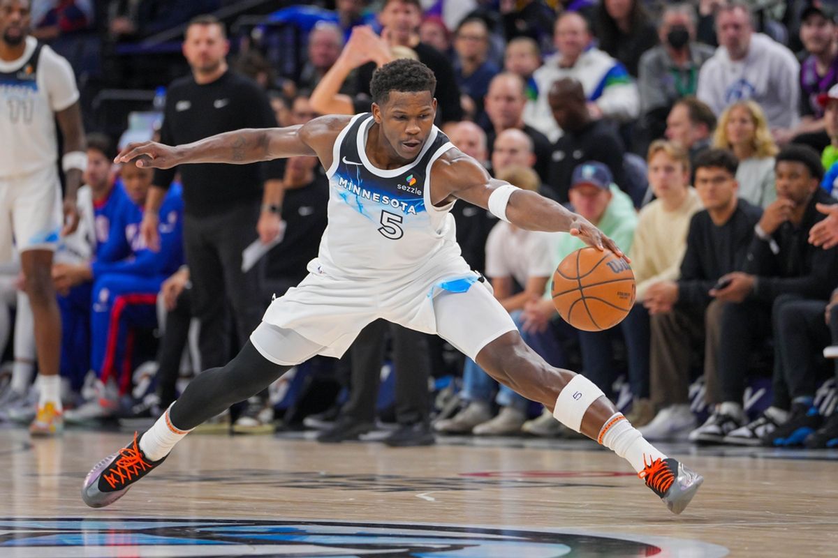 Nov 27, 2024; Minneapolis, Minnesota, USA; Minnesota Timberwolves guard Anthony Edwards (5) chases down a loose ball against the Sacramento Kings in the fourth quarter at Target Center. Mandatory Credit: Brad Rempel-Imagn Images