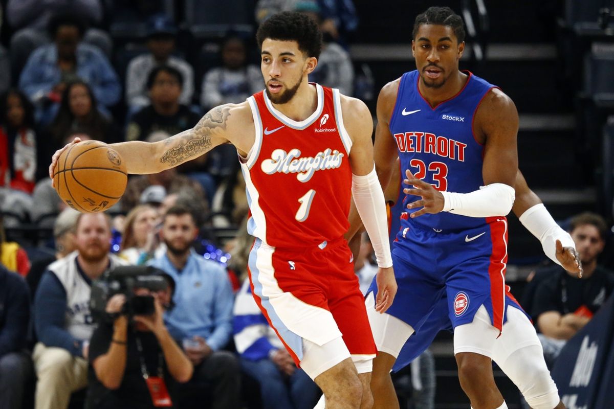 Nov 27, 2024; Memphis, Tennessee, USA; Memphis Grizzlies guard Scotty Pippen Jr. (1) dribbles the ball as Detroit Pistons guard Jaden Ivey (23) defends during the first quarter at FedExForum. Mandatory Credit: Petre Thomas-Imagn Images