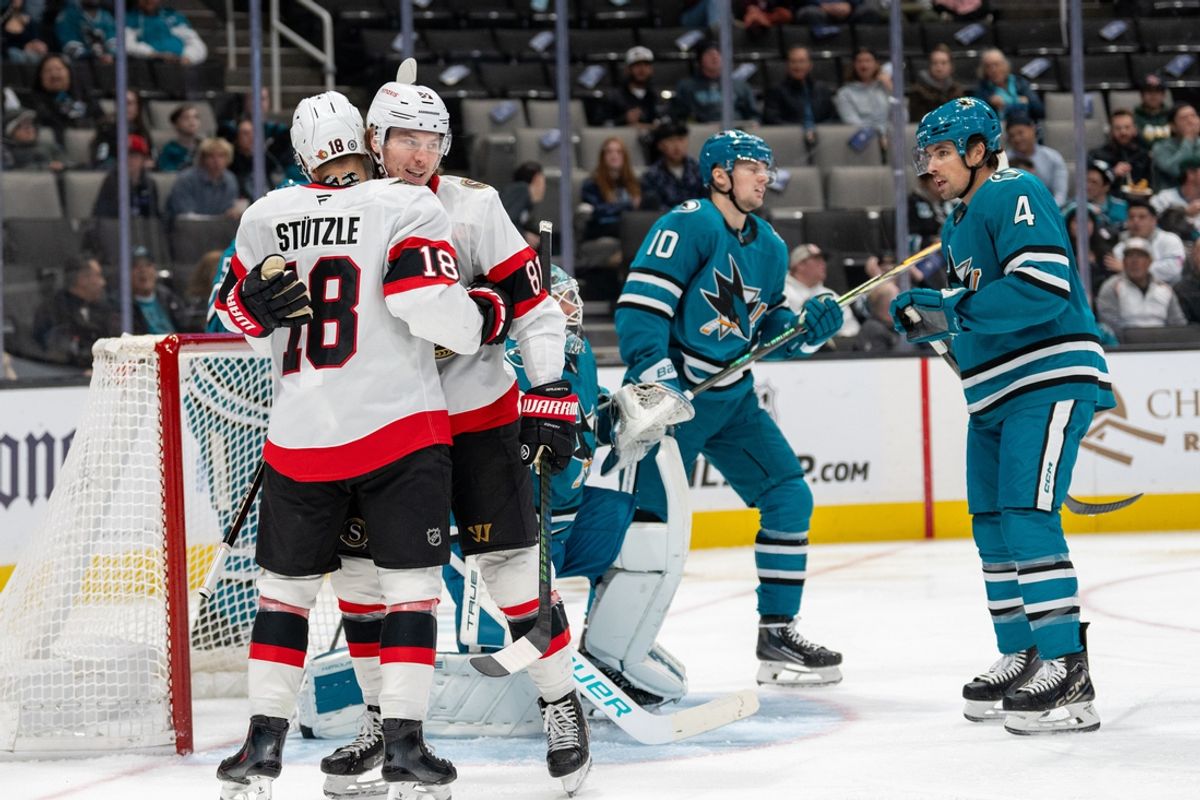 Nov 27, 2024; San Jose, California, USA; Ottawa Senators center Tim Stützle (18) and Ottawa Senators right wing Adam Gaudette (81) celebrate after the goal against the San Jose Sharks during the first period at SAP Center at San Jose. Mandatory Credit: Neville E. Guard-Imagn Images