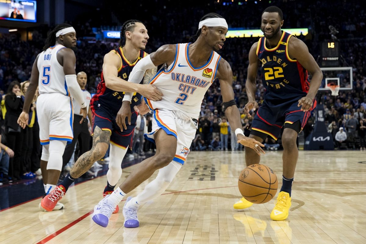 Nov 27, 2024; San Francisco, California, USA; Oklahoma City Thunder guard Shai Gilgeous-Alexander (2) gets possession against the Golden State Warriors during the fourth quarter at Chase Center. Mandatory Credit: John Hefti-Imagn Images