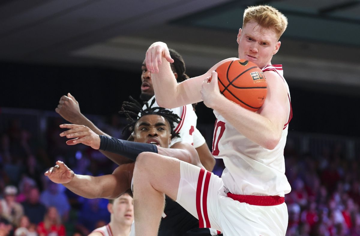 Nov 28, 2024; Paradise Island, Bahamas, BHS;  Indiana Hoosiers forward Luke Goode (10) grabs the ball away from Gonzaga Bulldogs guard Michael Ajayi (1) during the second half at Imperial Arena at the Atlantis resort. Mandatory Credit: Kevin Jairaj-Imagn Images