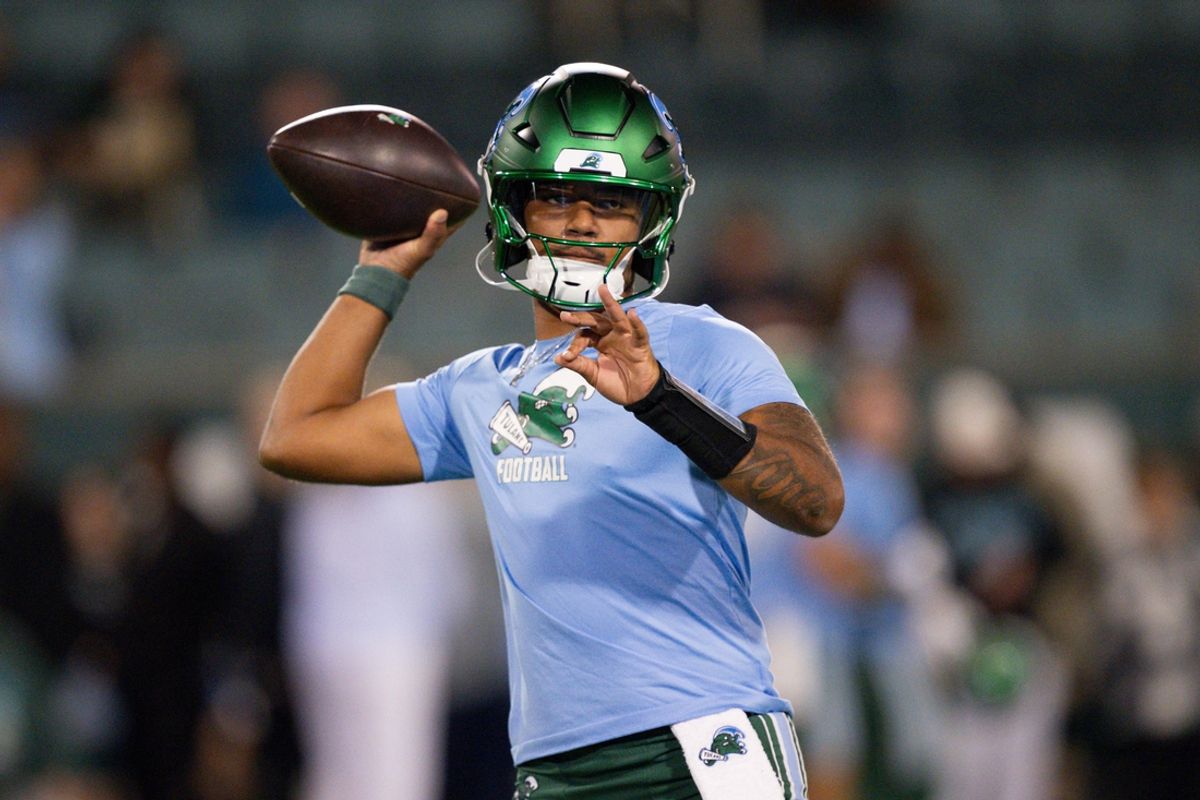 Nov 28, 2024; New Orleans, Louisiana, USA; Tulane Green Wave quarterback Ty Thompson (7) throws before a game against the Memphis Tigers at Yulman Stadium. Mandatory Credit: Matthew Hinton-Imagn Images