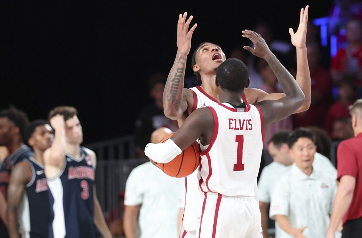 Nov 28, 2024;  Paradise Island, Bahamas, BHS; Oklahoma Sooners guard Kobe Elvis (1) celebrates with Oklahoma Sooners forward Jalon Moore (14) after the game against the Arizona Wildcats in the Imperial Arena at the Atlantis Resort.  Mandatory Credit: Kevin Jairaj-Imagn Images