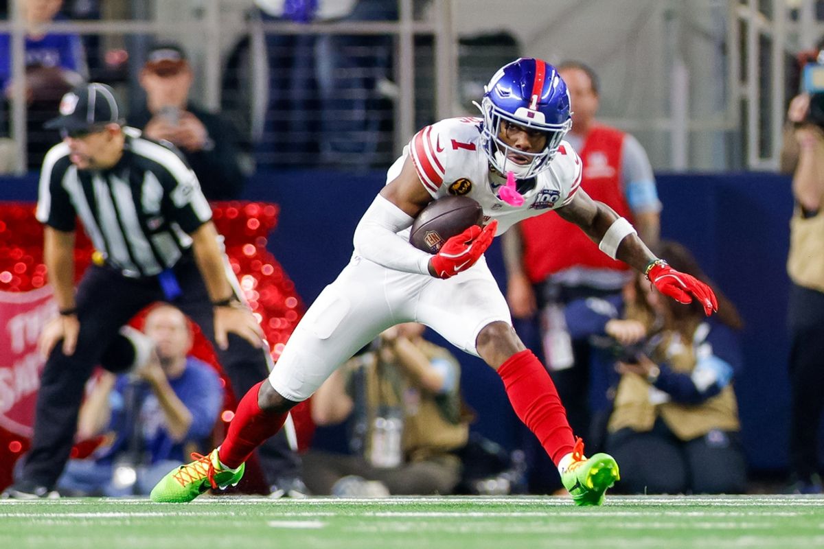 Nov 28, 2024; Arlington, Texas, USA; New York Giants wide receiver Malik Nabers (1) makes a catch during the fourth quarter against the Dallas Cowboys at AT&T Stadium. Mandatory Credit: Andrew Dieb-Imagn Images