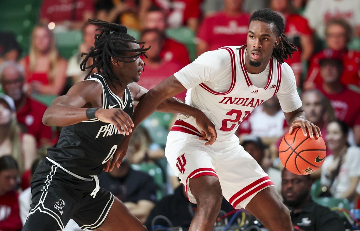 Nov 29, 2024; Paradise Island, Bahamas, BHS; Indiana Hoosiers forward Mackenzie Mgbako (21) dribbles as Providence Friars guard Wesley Cardet Jr. (0) defends during the second half at Imperial Arena at the Atlantis resort.  Mandatory Credit: Kevin Jairaj-Imagn Images