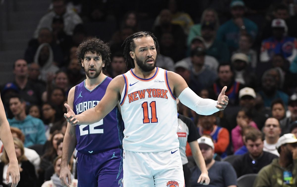 Nov 29, 2024; Charlotte, North Carolina, USA;  New York Knicks guard Jalen Brunson (11) complains about a possible foul during the second half against the Charlotte Hornets at the Spectrum Center. Mandatory Credit: Sam Sharpe-Imagn Images