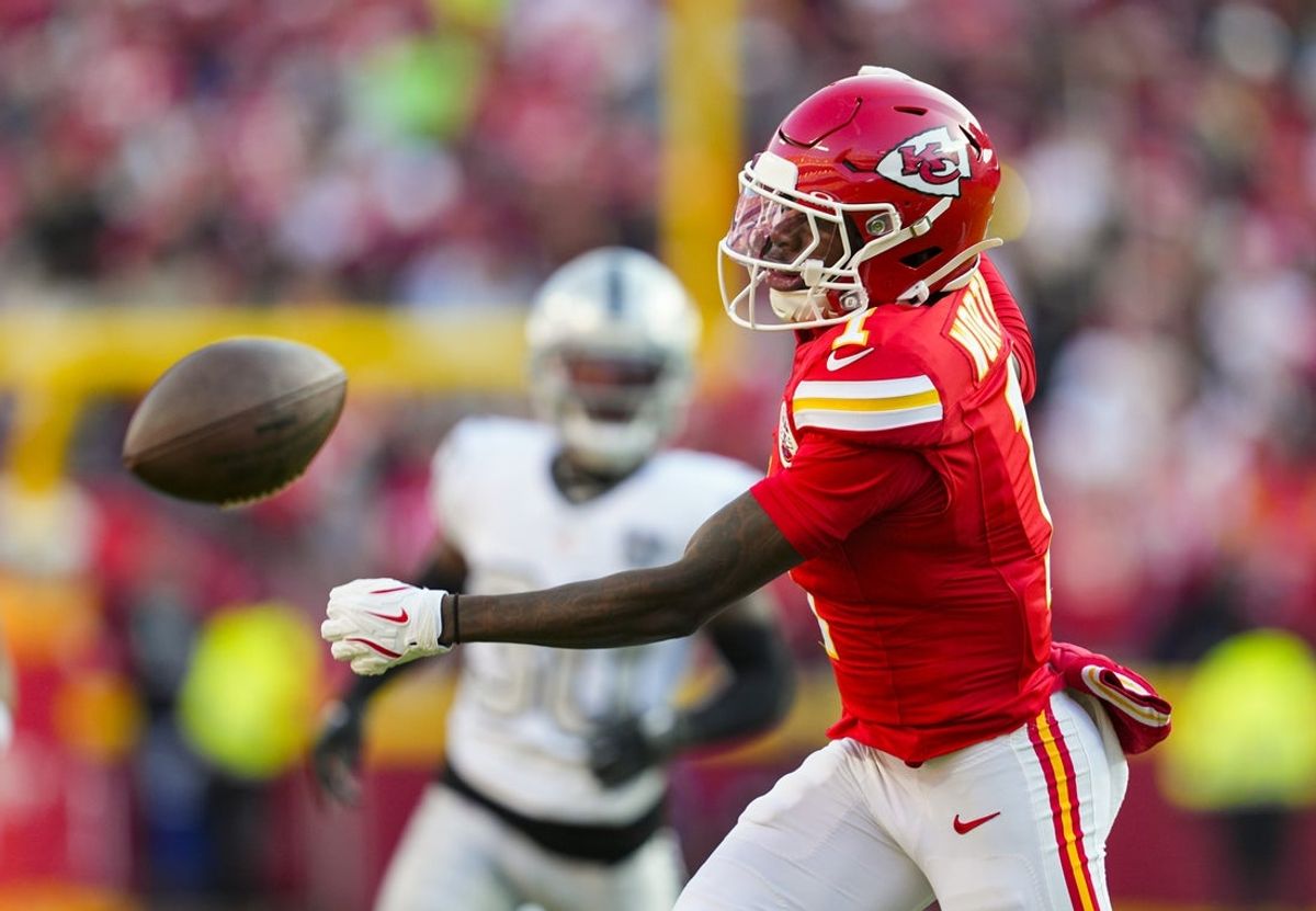 Nov 29, 2024; Kansas City, Missouri, USA; Kansas City Chiefs wide receiver Xavier Worthy (1) is unable to make a catch during the first half against the Las Vegas Raiders at GEHA Field at Arrowhead Stadium. Mandatory Credit: Jay Biggerstaff-Imagn Images