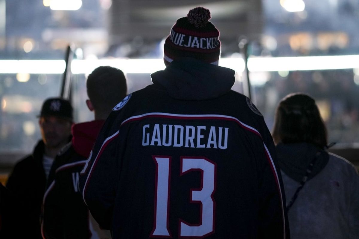 Nov 29, 2024; Columbus, Ohio, USA;  A fan wearing a Johnny Gaudreau jersey enters the seating area before the game between the Calgary Flames and the Columbus Blue Jackets at Nationwide Arena. Mandatory Credit: Aaron Doster-Imagn Images