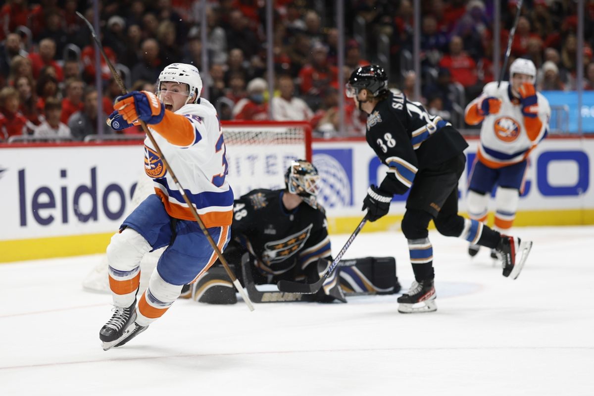 Nov 29, 2024; Washington, District of Columbia, USA; New York Islanders center Kyle MacLean (32) celebrates after scoring a goal against the Washington Capitals in the second period at Capital One Arena. Mandatory Credit: Geoff Burke-Imagn Images