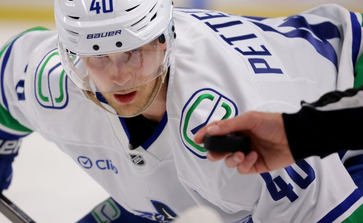 Nov 29, 2024; Buffalo, New York, USA;  Vancouver Canucks center Elias Pettersson (40) waits for the linesman to drop the puck for a face-off during the third period against the Buffalo Sabres at KeyBank Center. Mandatory Credit: Timothy T. Ludwig-Imagn Images