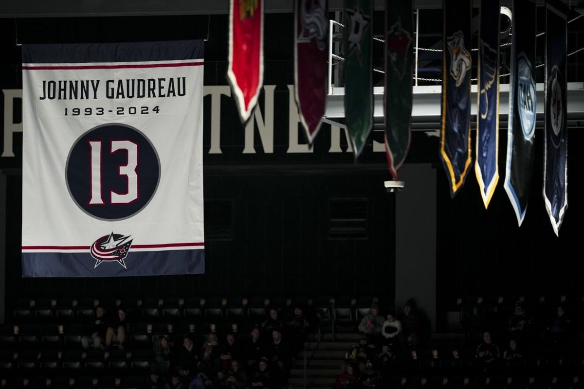Nov 29, 2024; Columbus, Ohio, USA;  A banner honoring the late Johnny Gaudreau is seen in the rafters before the game between the Calgary Flames and the Columbus Blue Jackets at Nationwide Arena. Mandatory Credit: Aaron Doster-Imagn Images