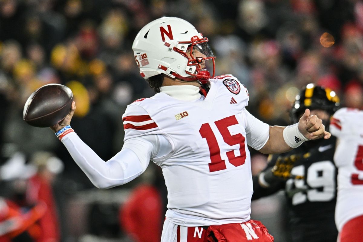 Nov 29, 2024; Iowa City, Iowa, USA; Nebraska Cornhuskers quarterback Dylan Raiola (15) throws a pass against the Iowa Hawkeyes during the first quarter at Kinnick Stadium. Mandatory Credit: Jeffrey Becker-Imagn Images