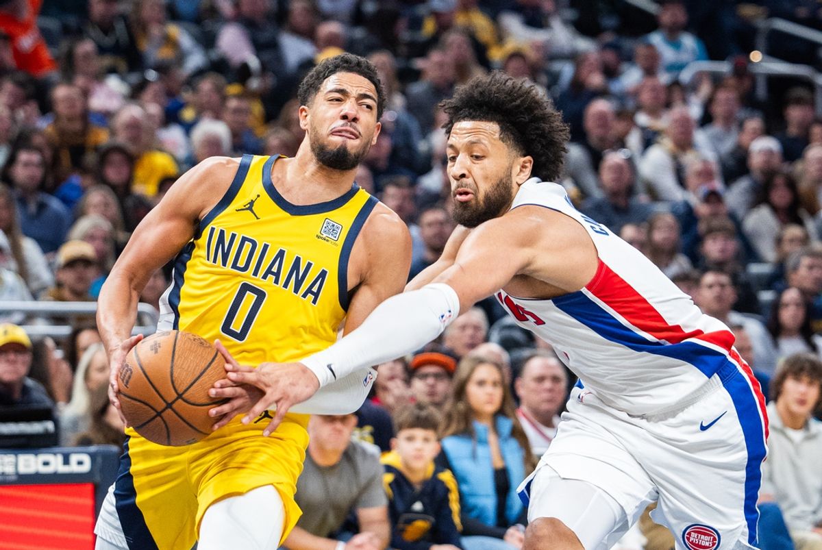 Nov 29, 2024; Indianapolis, Indiana, USA; Indiana Pacers guard Tyrese Haliburton (0) shoots the ball while Detroit Pistons guard Cade Cunningham (2) defends in the first half  at Gainbridge Fieldhouse. Mandatory Credit: Trevor Ruszkowski-Imagn Images