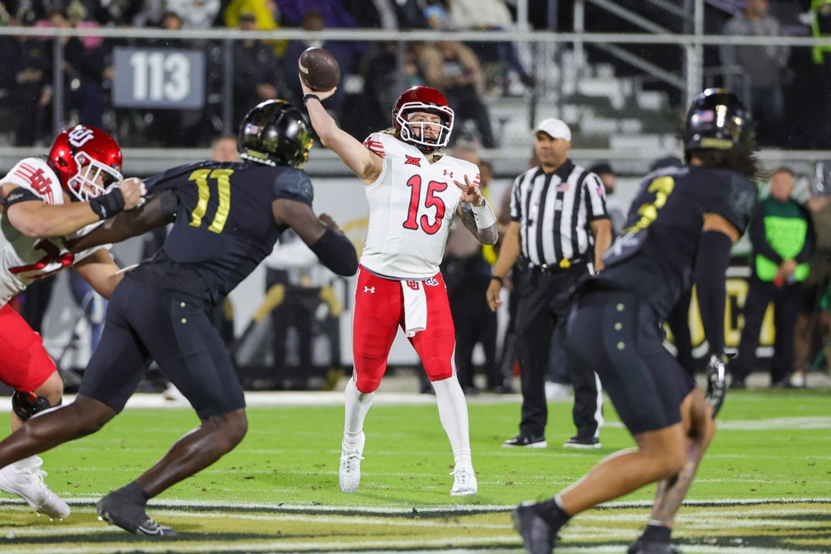 Nov 29, 2024; Orlando, Florida, USA; Utah Utes quarterback Luke Bottari (15) passes the ball during the first quarter against the UCF Knights at FBC Mortgage Stadium. Mandatory Credit: Mike Watters-Imagn Images
