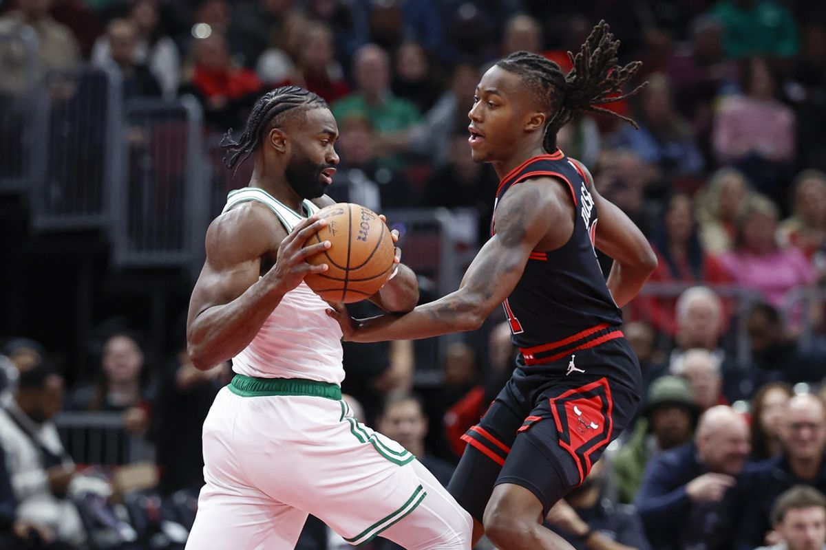 Nov 29, 2024; Chicago, Illinois, USA; Chicago Bulls forward Jalen Smith (7) drives to the basket against Chicago Bulls guard Ayo Dosunmu (11) during the first half at United Center. Mandatory Credit: Kamil Krzaczynski-Imagn Images