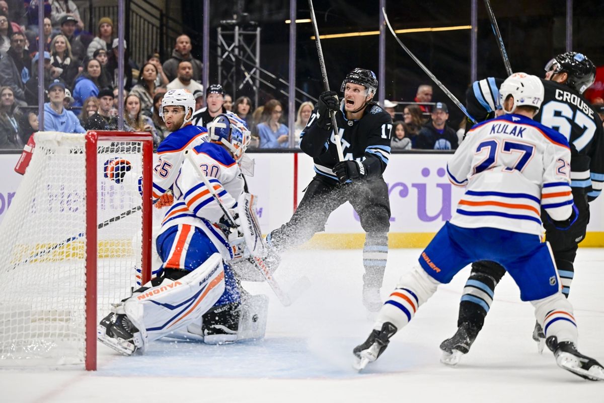 Nov 29, 2024; Salt Lake City, Utah, USA; Edmonton Oilers goaltender Calvin Pickard (30) blocks a shot by Utah Hockey Club center Nick Bjugstad (17) during the second period at the Delta Center. Mandatory Credit: Christopher Creveling-Imagn Images