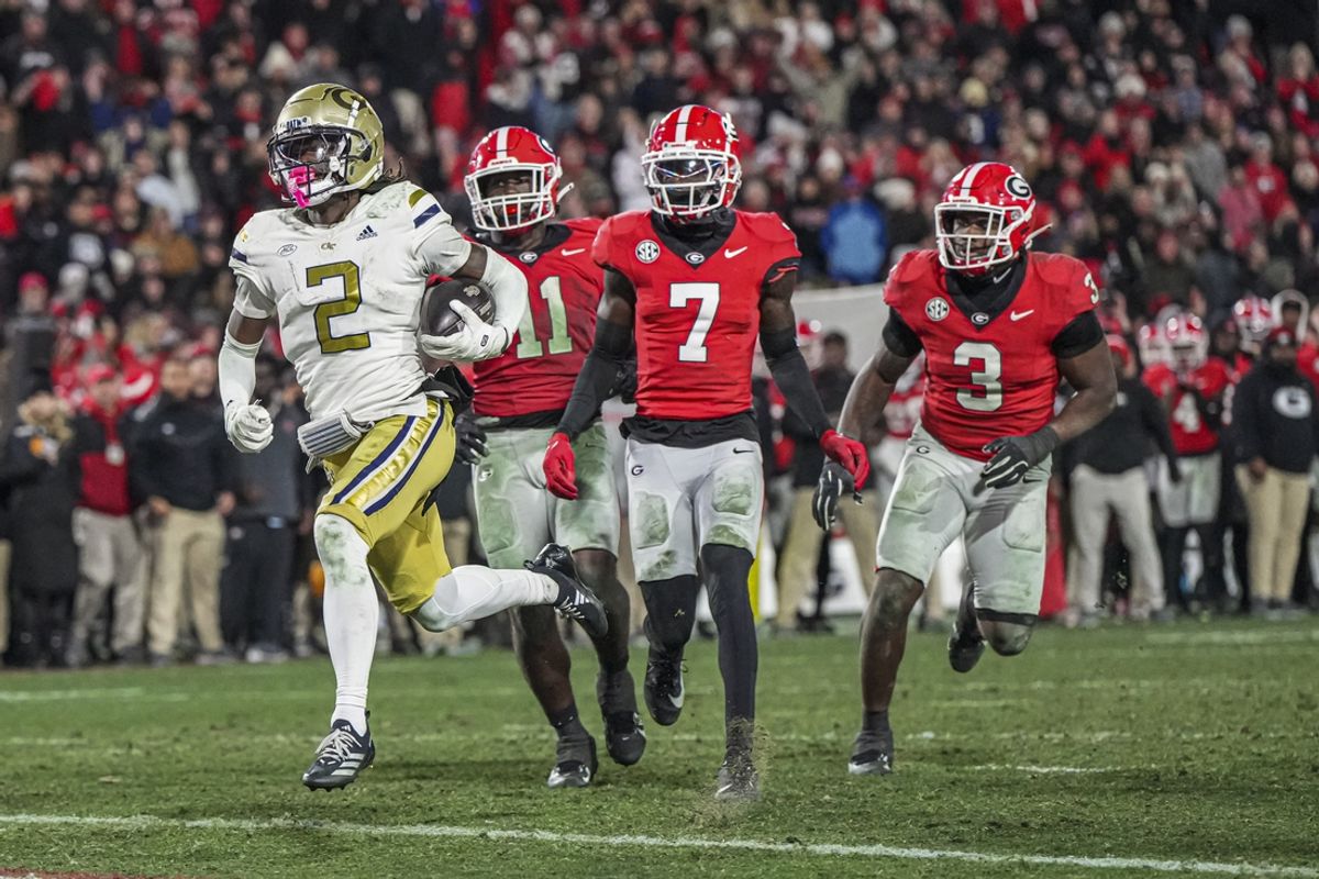 Nov 29, 2024; Athens, Georgia, USA; Georgia Tech Yellow Jackets wide receiver Eric Singleton Jr. (2) scores a touchdown against the Georgia Bulldogs during overtime at Sanford Stadium. Mandatory Credit: Dale Zanine-Imagn Images