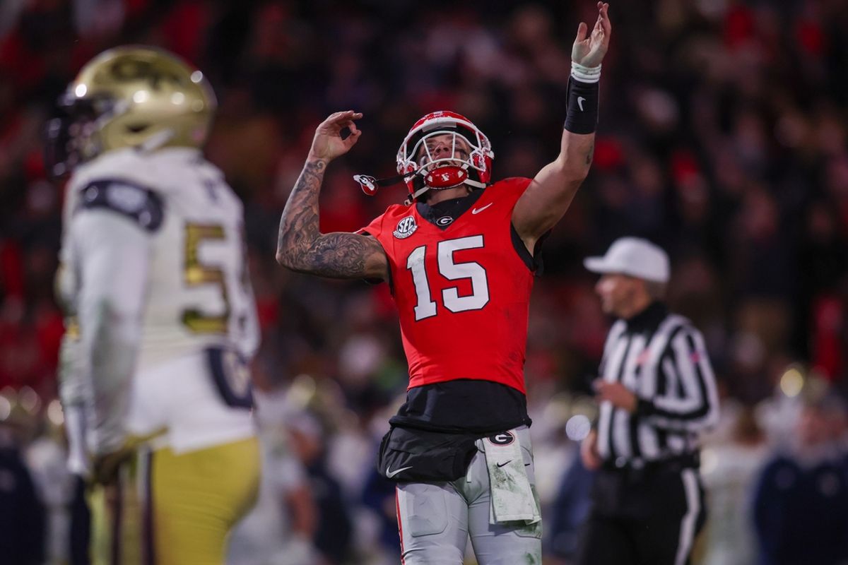 Nov 29, 2024; Athens, Georgia, USA; Georgia Bulldogs quarterback Carson Beck (15) reacts after a touchdown against the Georgia Tech Yellow Jackets in the fourth quarter at Sanford Stadium. Mandatory Credit: Brett Davis-Imagn Images