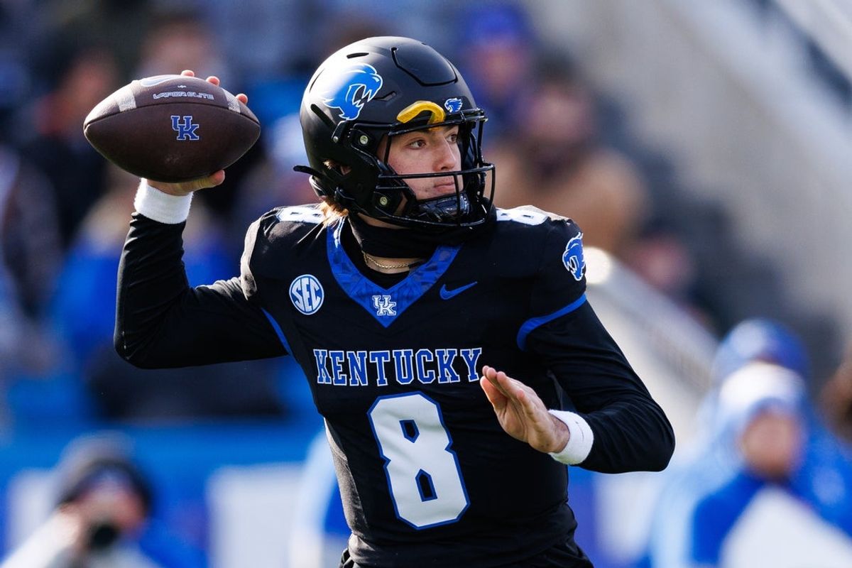 Nov 30, 2024; Lexington, Kentucky, USA; Kentucky Wildcats quarterback Cutter Boley (8) throws a pass during the first quarter against the Louisville Cardinals at Kroger Field. Mandatory Credit: Jordan Prather-Imagn Images