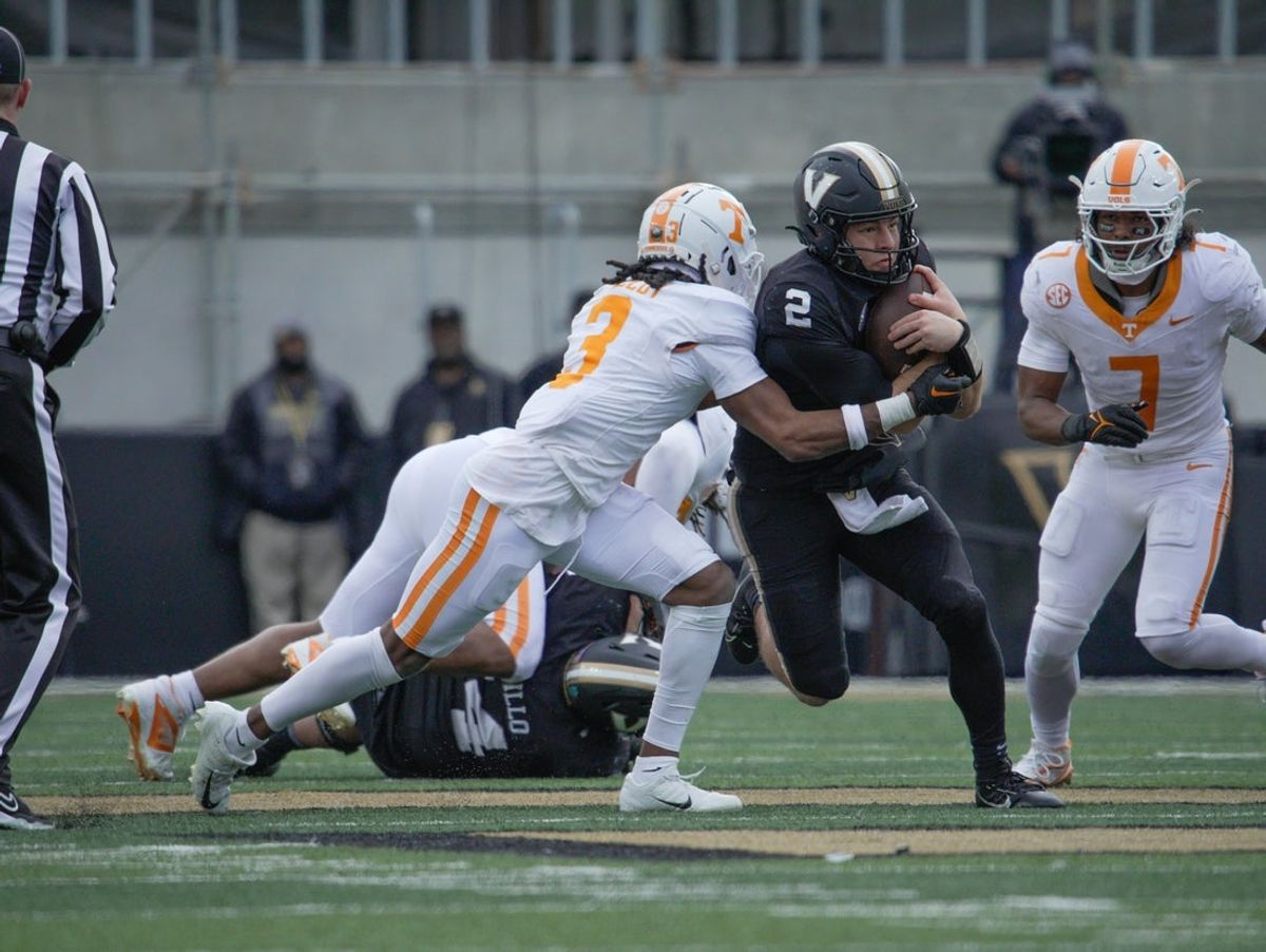 Tennessee defensive back Jermod McCoy (3) tackles Vanderbilt quarterback Diego Pavia (2) during the second quarter at FirstBank Stadium in Nashville, Tenn., Saturday, Nov. 30, 2024.