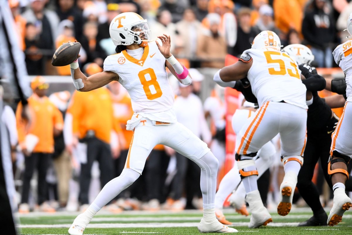 Nov 30, 2024; Nashville, Tennessee, USA;  Tennessee Volunteers quarterback Nico Iamaleava (8) passes the ball against the Vanderbilt Commodores during the first half at FirstBank Stadium. Mandatory Credit: Steve Roberts-Imagn Images