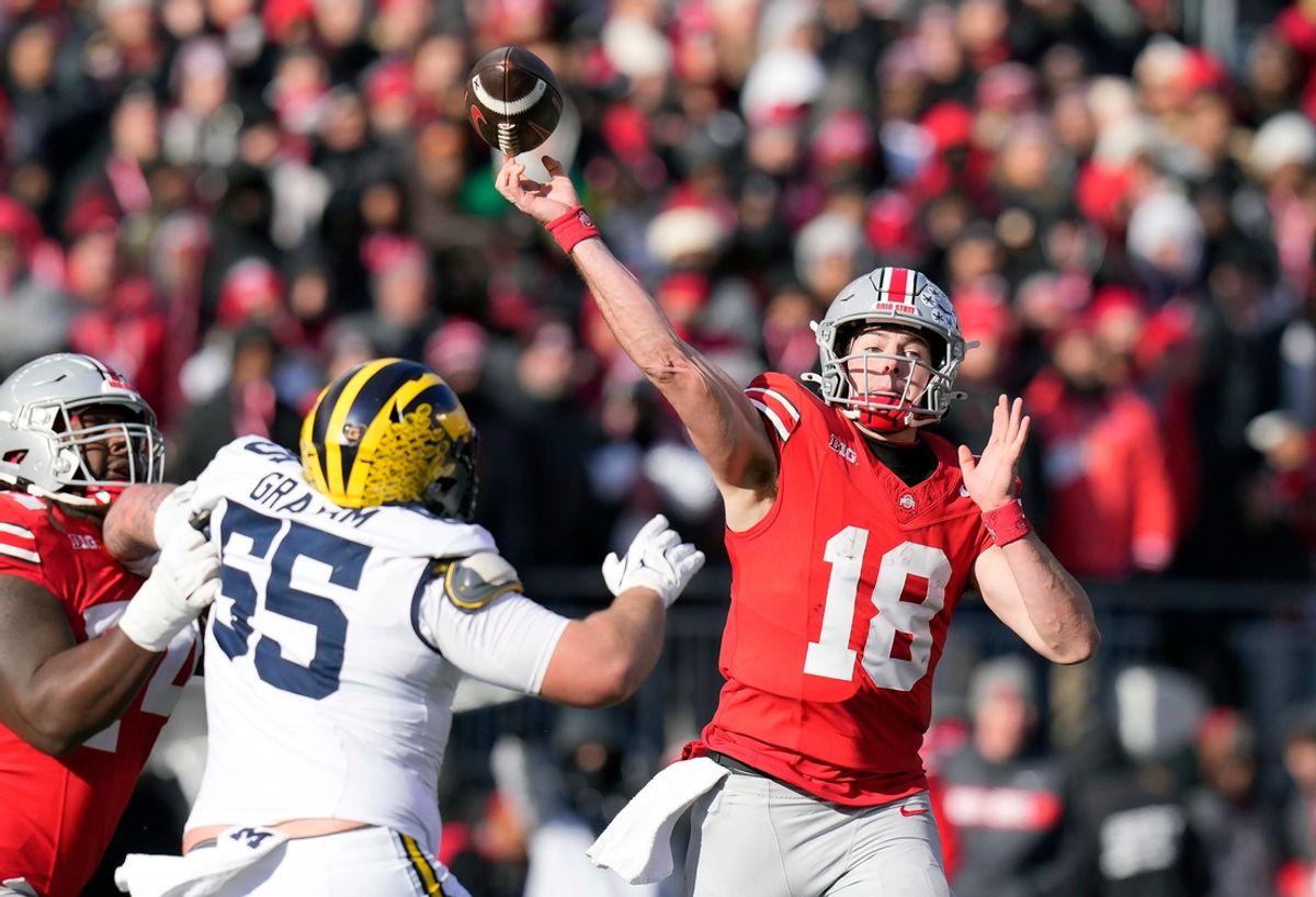 Ohio State Buckeyes quarterback Will Howard (18) throws the ball against Michigan Wolverines during the second quarter of the NCAA football game at Ohio Stadium in Columbus on Saturday, Nov. 30, 2024.