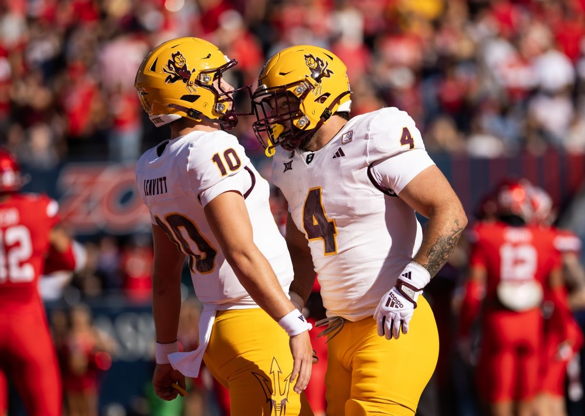 Nov 30, 2024; Tucson, Arizona, USA; Arizona State Sun Devils running back Cam Skattebo (4) celebrates with quarterback Sam Leavitt (10) after scoring a touchdown against the Arizona Wildcats in the first half during the Territorial Cup at Arizona Stadium. Mandatory Credit: Mark J. Rebilas-Imagn Images