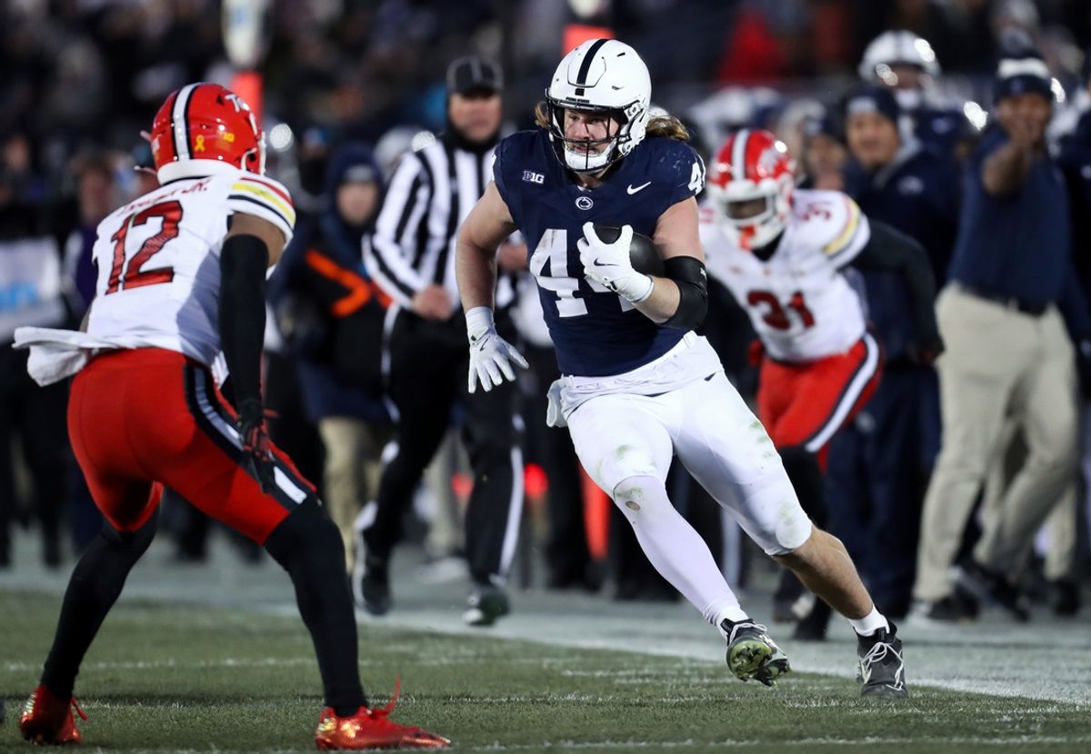 Nov 30, 2024; University Park, Pennsylvania, USA; Penn State Nittany Lions tight end Tyler Warren (44) runs with the ball against the Maryland Terrapins during the second quarter at Beaver Stadium. Mandatory Credit: Matthew O'Haren-Imagn Images