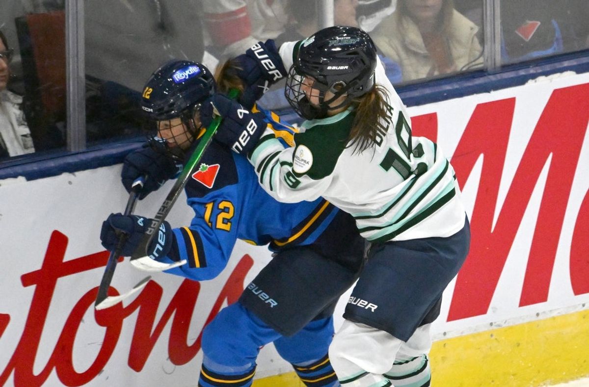 Nov 30, 2024; Toronto, ON, CANADA;  Boston Fleet forward Hannah Bilka (19) collides with Toronto Sceptres defender Allie Munroe (12) in the second period at Coca-Cola Coliseum. Mandatory Credit: Dan Hamilton-Imagn Images