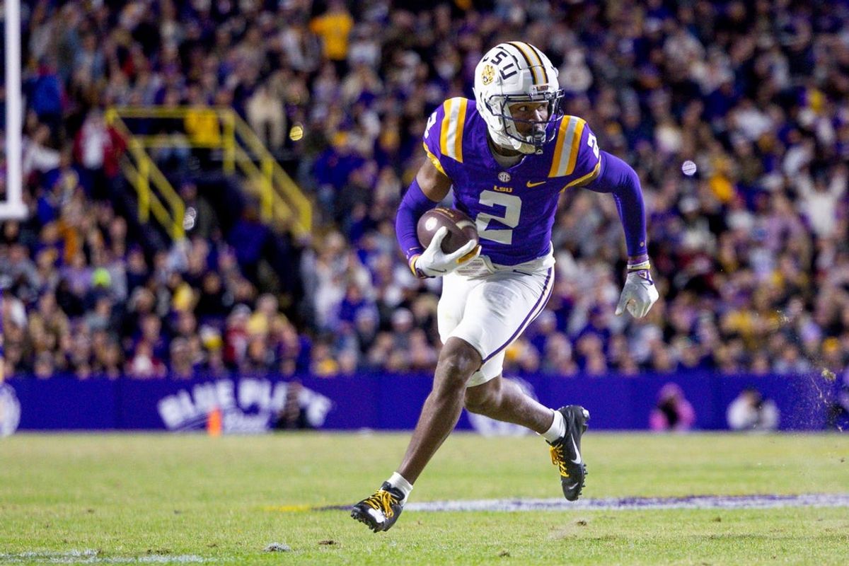 Nov 30, 2024; Baton Rouge, Louisiana, USA;  LSU Tigers wide receiver Kyren Lacy (2) runs after a catch against the Oklahoma Sooners during the first quarter at Tiger Stadium. Mandatory Credit: Stephen Lew-Imagn Images