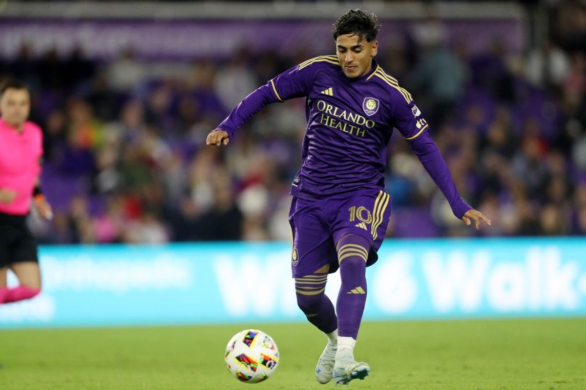 Nov 30, 2024; Orlando, Florida, USA; Orlando City midfielder Facundo Torres (10) controls the ball against the New York Red Bulls during the second half in the 2024 MLS Cup Eastern Conference Final match at Inter&Co Stadium. Mandatory Credit: Morgan Tencza-Imagn Images