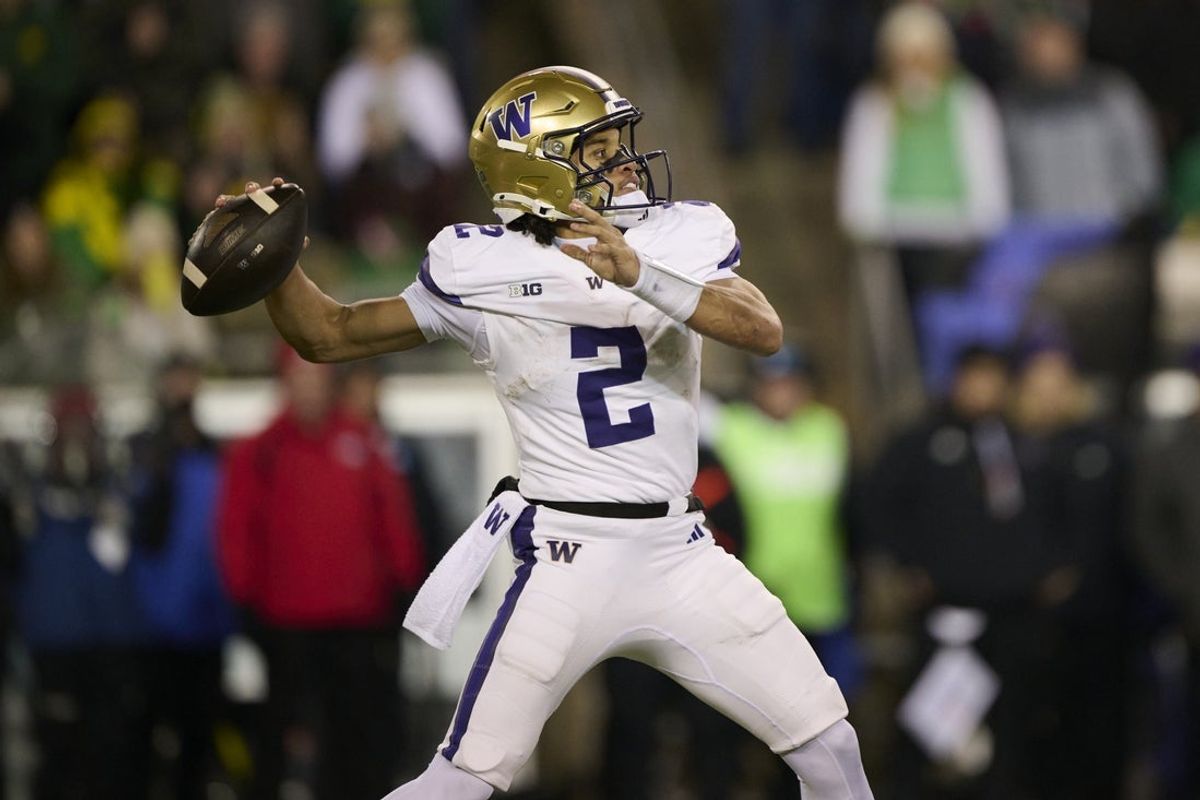 Nov 30, 2024; Eugene, Oregon, USA; Washington Huskies quarterback Demond Williams Jr. (2) throws a pass during the first half against the Oregon Ducks at Autzen Stadium. Mandatory Credit: Troy Wayrynen-Imagn Images