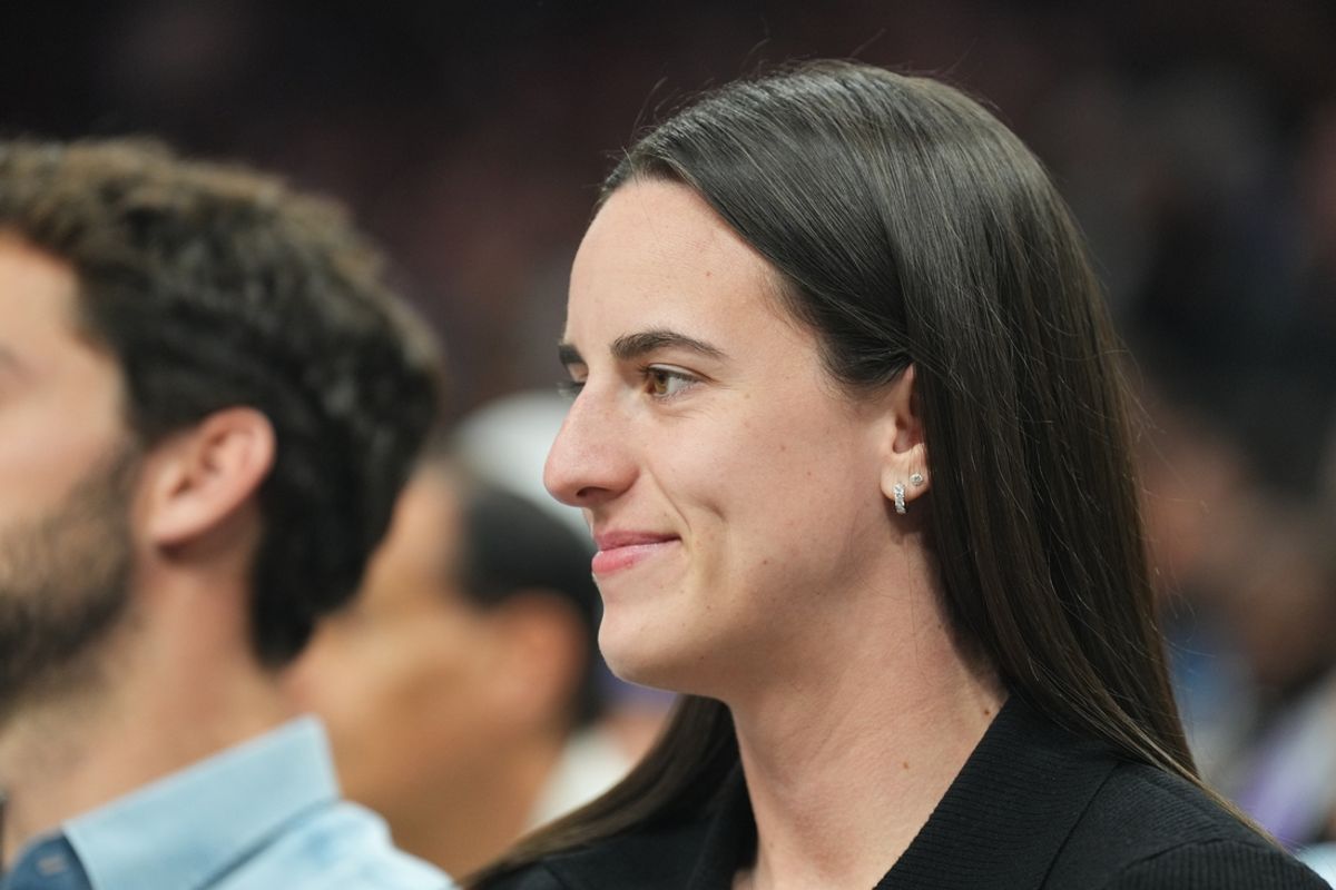Nov 30, 2024; Phoenix, Arizona, USA; Indiana Fever player Caitlin Clark attends the game between the Phoenix Suns and the Golden State Warriors during the first half at Footprint Center. Mandatory Credit: Joe Camporeale-Imagn Images