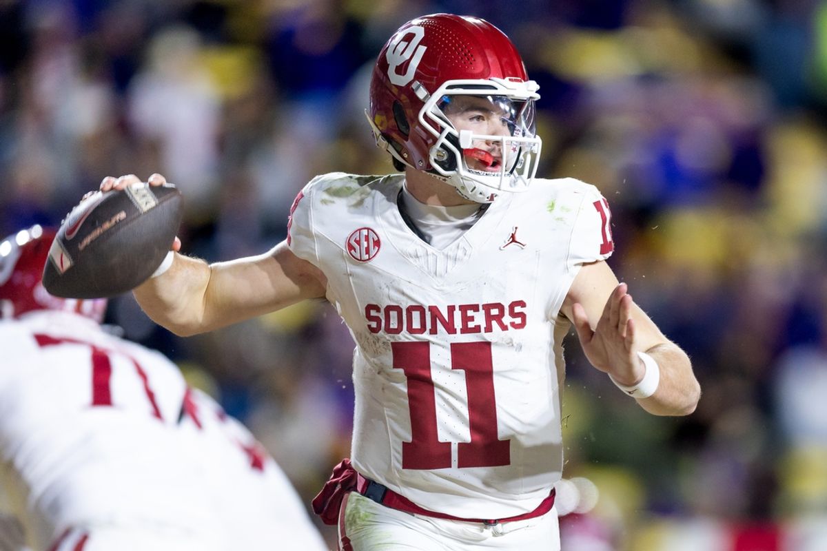 Nov 30, 2024; Baton Rouge, Louisiana, USA;  Oklahoma Sooners quarterback Jackson Arnold (11) passes against the LSU Tigers during the fourth quarter at Tiger Stadium. Mandatory Credit: Stephen Lew-Imagn Images