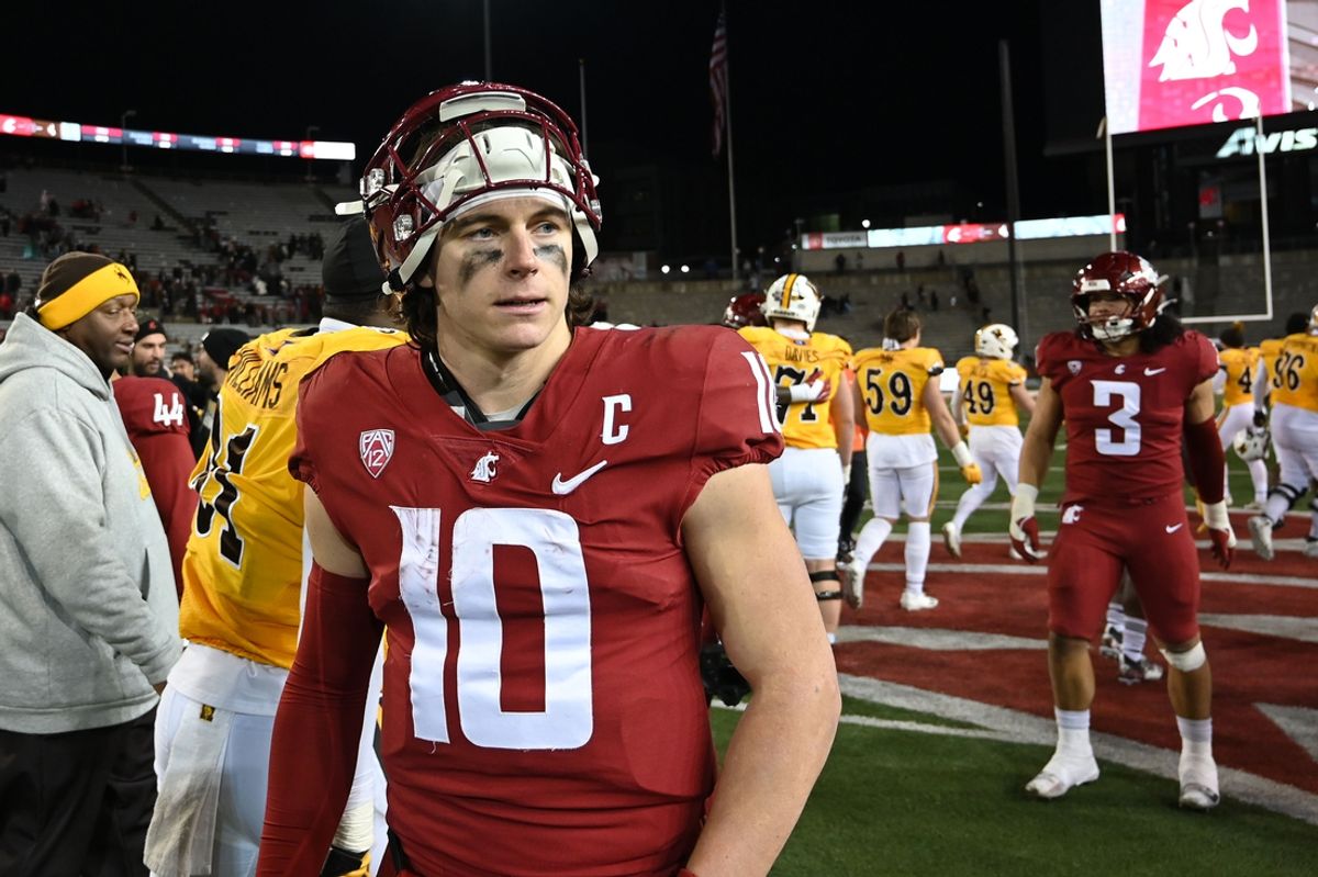 Nov 30, 2024; Pullman, Washington, USA; Washington State Cougars quarterback John Mateer (10) walks off the field after a game against the Wyoming Cowboys at Gesa Field at Martin Stadium. Washington State Cougars won 15-14. Mandatory Credit: James Snook-Imagn Images