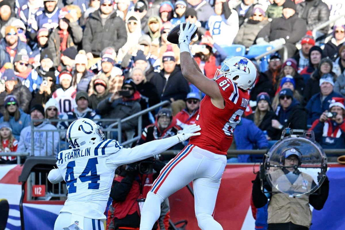 Dec 1, 2024; Foxborough, Massachusetts, USA; New England Patriots tight end Austin Hooper (81) makes a catch for a touchdown  against the Indianapolis Colts during the first half at Gillette Stadium. Mandatory Credit: Eric Canha-Imagn Images