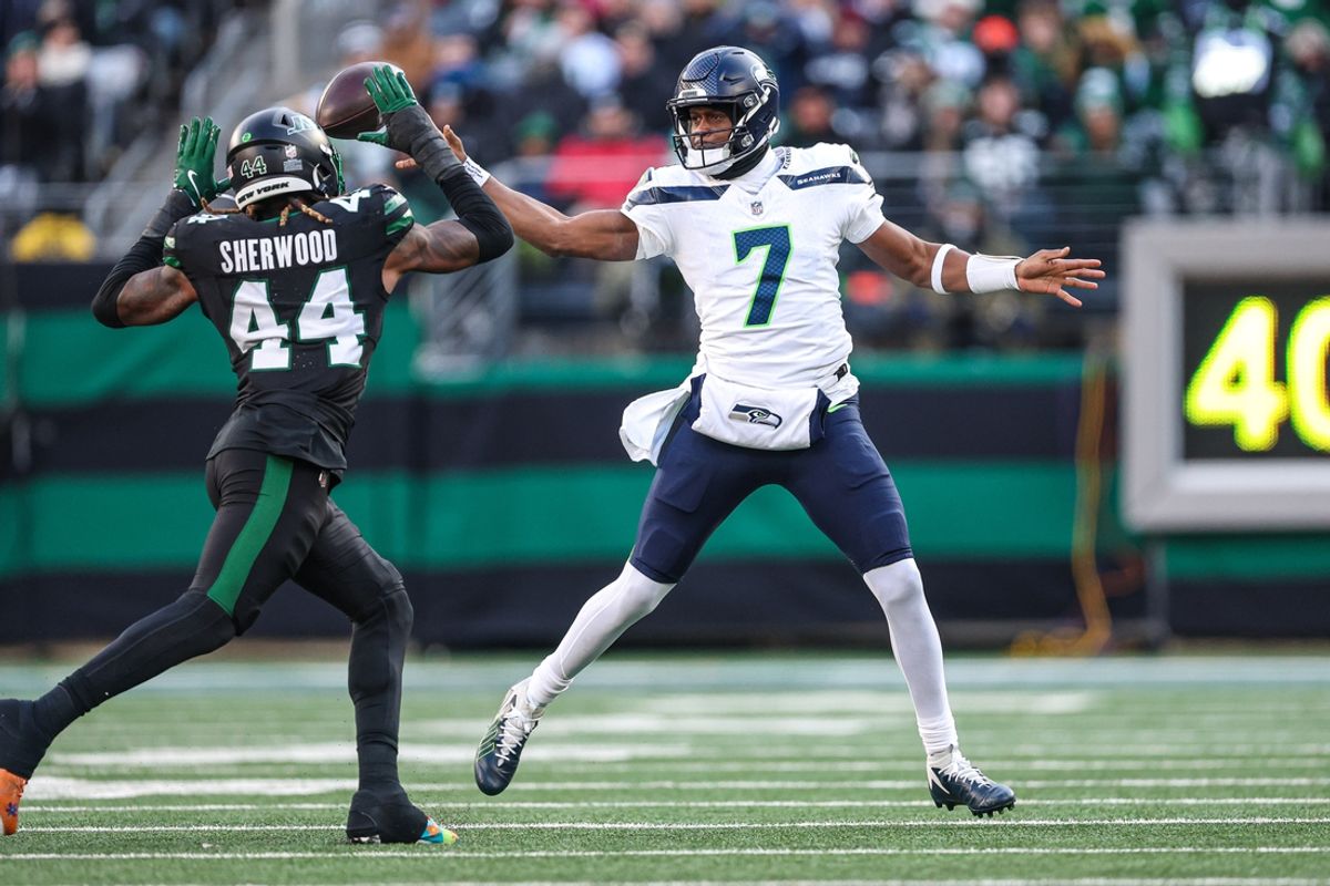 Dec 1, 2024; East Rutherford, New Jersey, USA; New York Jets linebacker Jamien Sherwood (44) knocks down a pass by Seattle Seahawks quarterback Geno Smith (7) during the first half at MetLife Stadium. Mandatory Credit: Vincent Carchietta-Imagn Images