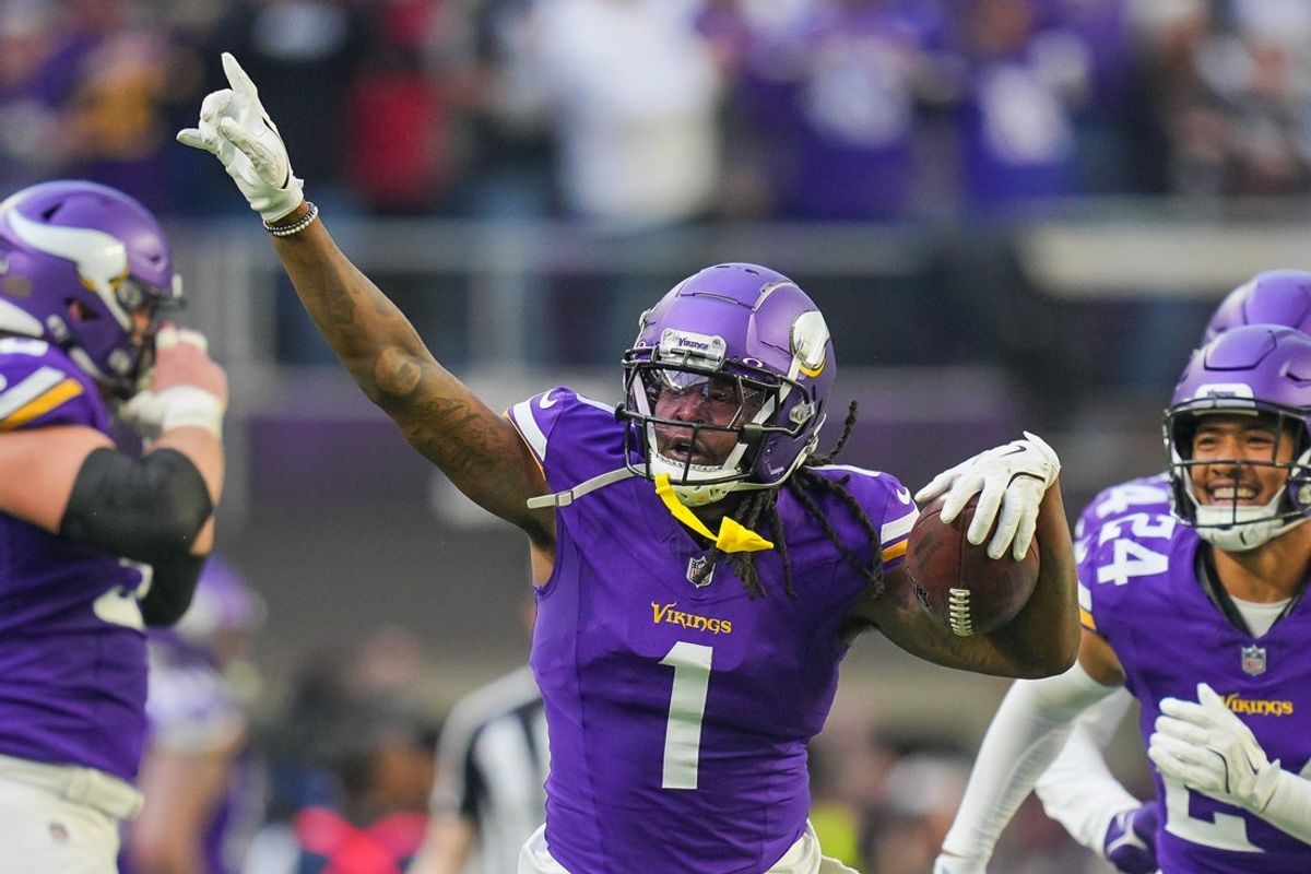 Dec 1, 2024; Minneapolis, Minnesota, USA; Minnesota Vikings cornerback Shaquill Griffin (1) celebrates his interception against the Arizona Cardinals in the fourth quarter at U.S. Bank Stadium. Mandatory Credit: Brad Rempel-Imagn Images