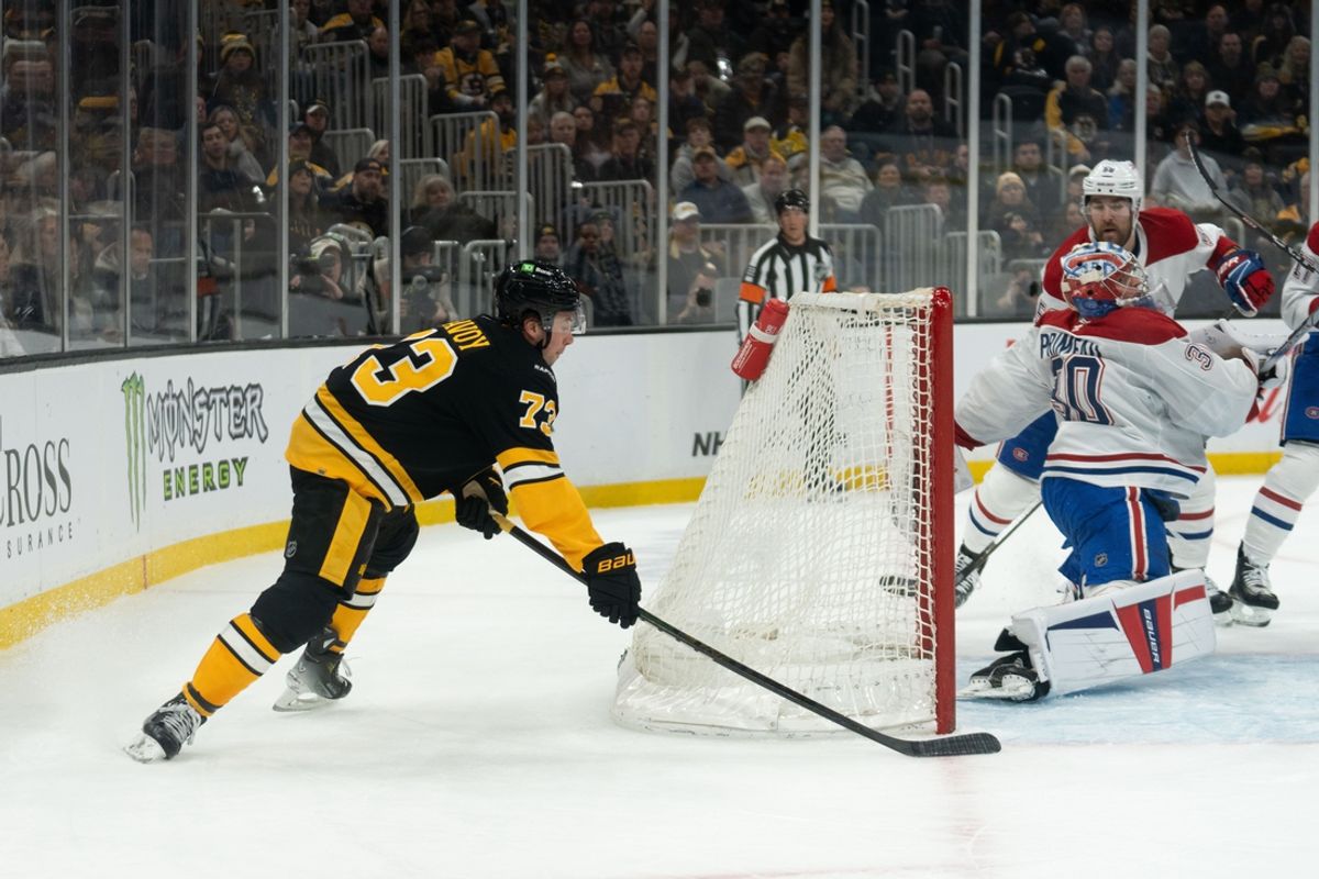 Dec 1, 2024; Boston, Massachusetts, USA; Boston Bruins defenseman Charlie McAvoy (73) scores on Montreal Canadiens goaltender Cayden Primeau (30) during the first period of a game at the TD Garden. Mandatory Credit: Natalie Reid-Imagn Images